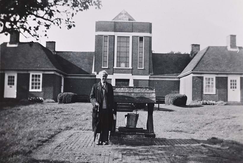Inline Image - Stanley standing before the Sandham Memorial Chapel © The Estate of Sir Stanley Spencer
