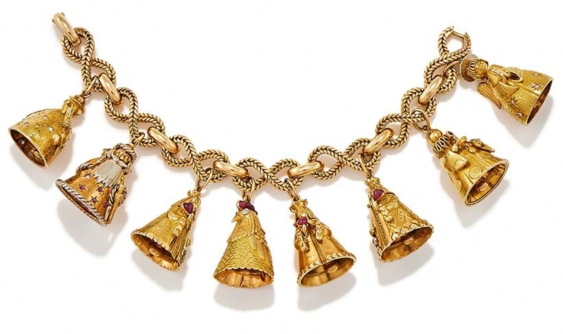 Inline Image - Lot 224: Van Cleef & Arpels, a gem set charm bracelet, circa 1960s | Sold for £118,950