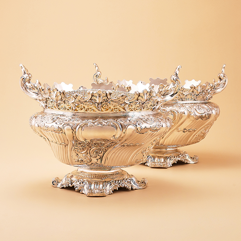 A pair of Victorian silver oval pedestal wine cisterns Ackroyd Rhodes, London 1895