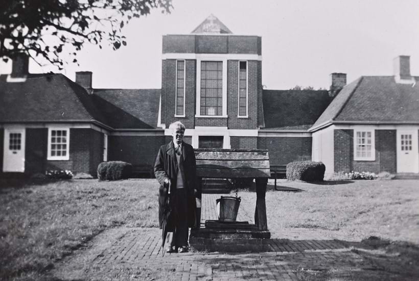 Inline Image - Stanley standing before the Sandham Memorial Chapel © The Estate of Sir Stanley Spencer