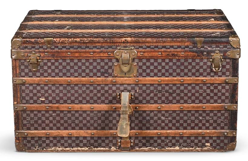 Inline Image - A Louis Vuitton a chequered coated canvas hard travel trunk, 20th century Sold for £8,820