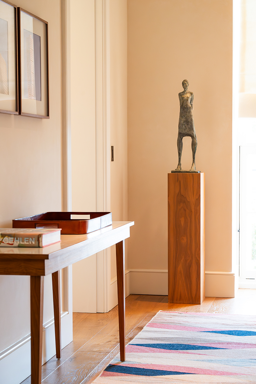 Inline Image - Lot 109: British School (20th Century), ‘Standing Figure’, Bronze with green patina | Est. £500-800 (fees) and Lot 39: A matched pair of Kilim runners or gallery carpets | Est. £1,500-2,500 (+ fees)