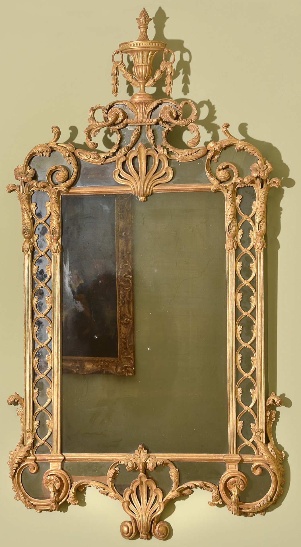 Inline Image - A George III carved gilt wood and gesso wall mirror, c. 1770, est. £15,000-25,000 (+fees)