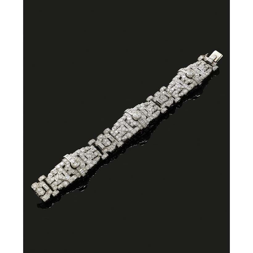 Inline Image - A mid 20th century diamond bracelet, the articulated geometric panels set with baguette, old European, brilliant cut and eight diamonds, approximately 10.40 carats total | Sold at Dreweatts for £16,380