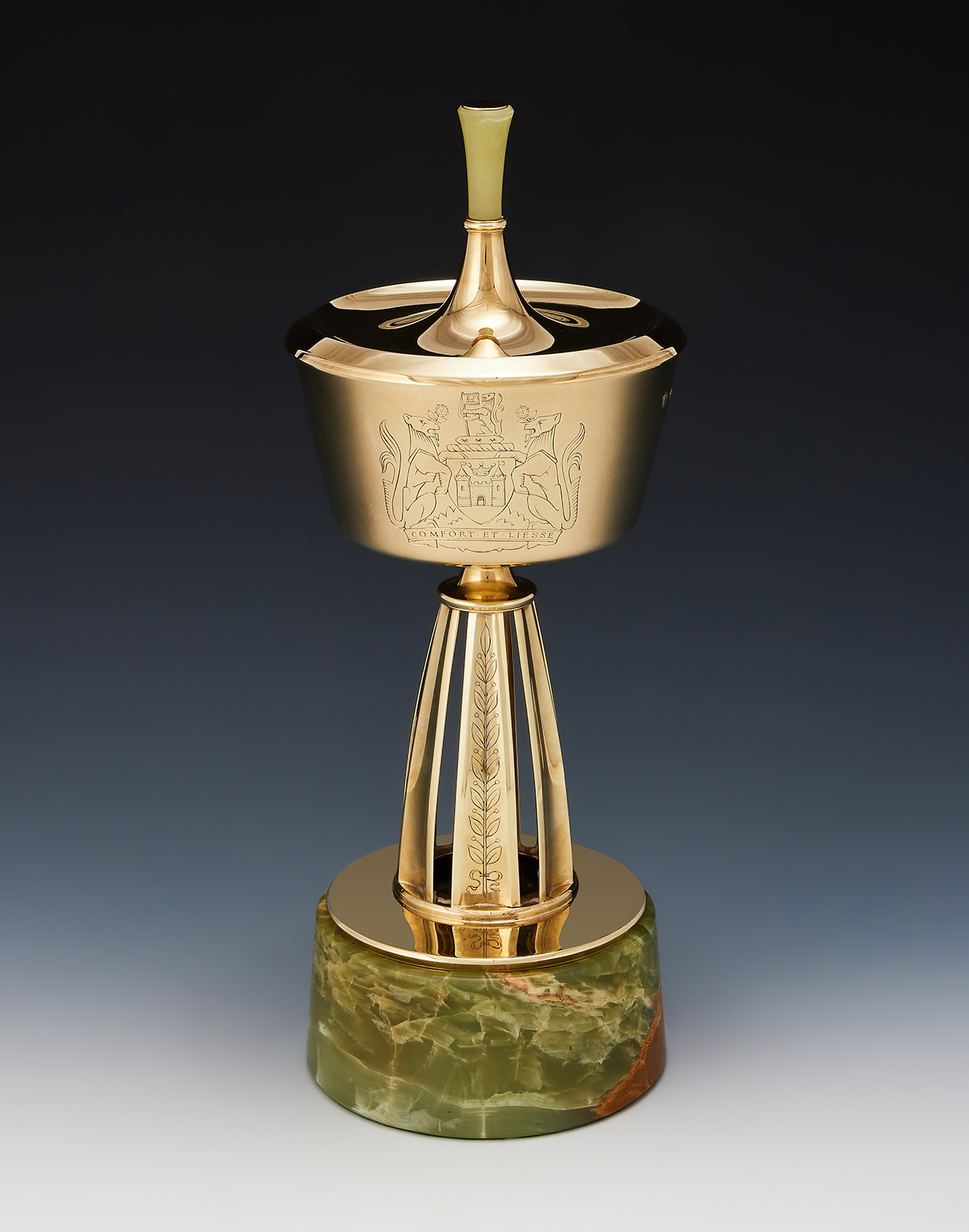 Inline Image - Lot 393: A 9 carat gold and green hardstone trophy cup and cover, C. J. Vander Ltd., London 1964, designed by Reginald Hill | Est. £25,000-35,000 (+ fees)