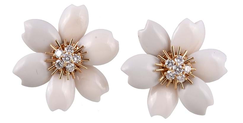 Inline Image - Van Cleef & Arpels, a pair of white coral and diamond 'Rose de Noel' earrings | Sold for £10,625