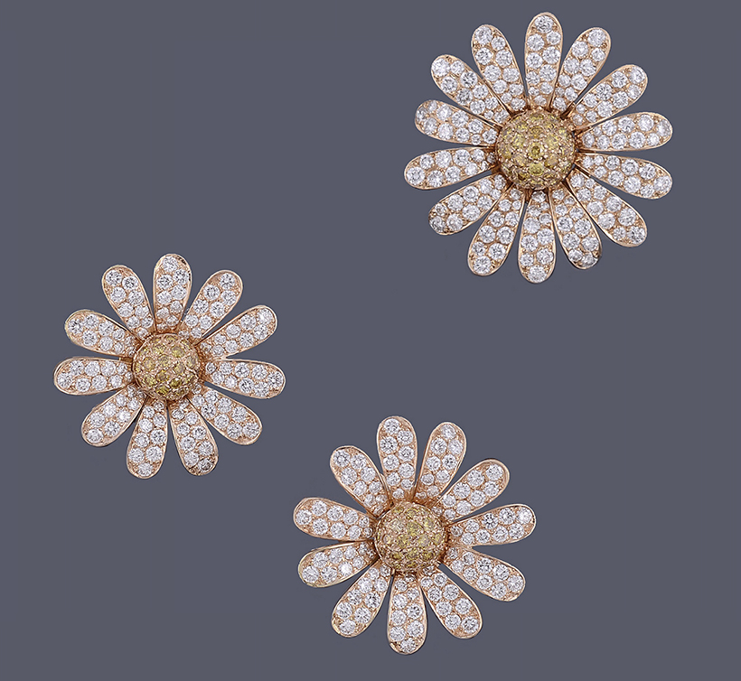 13882 Lot 541 Van Cleef & Arpels, a pair of marguerite diamond and yellow diamond ear clips and brooch Sold for £24,800.JPG