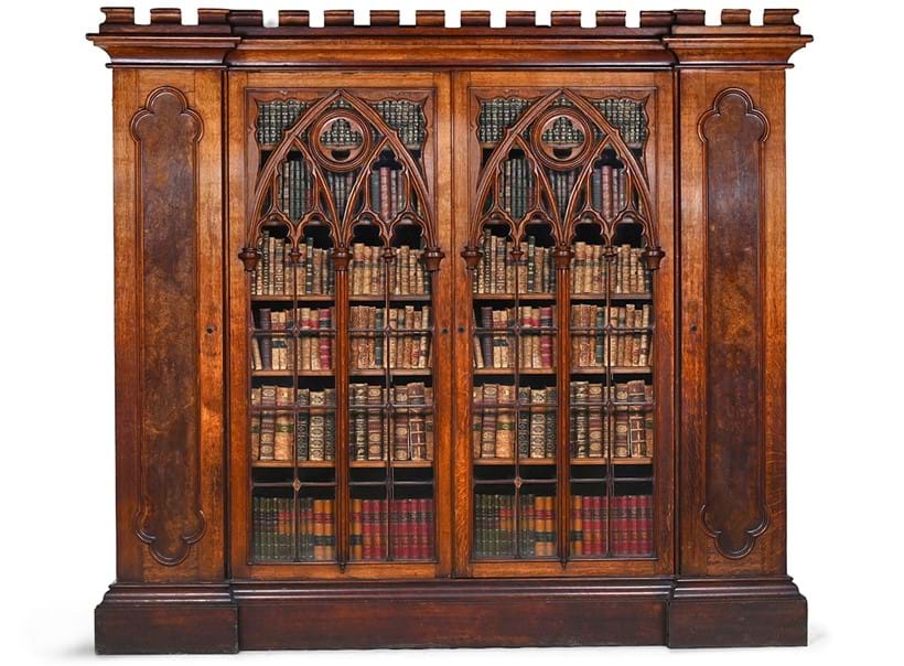 Inline Image - Lot 511: A Victorian Gothic Revival oak and pollard oak inverted breakfront bookcase cabinet circa 1880 | Sold for £20,320