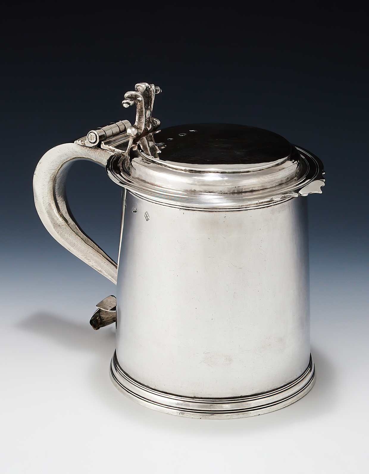 Inline Image - Lot 28: A James II silver tankard maker's mark OG, London 1685 | Sold for £6,985