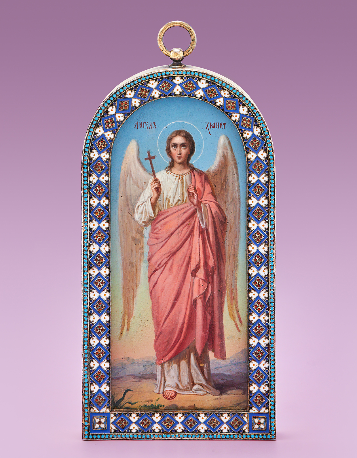 Inline Image - Lot 211: A Russian icon of the Guardian Angel in a cloisonné enamel frame, Ovchinnikov, Moscow 1899-1908 | Sold for £30,440