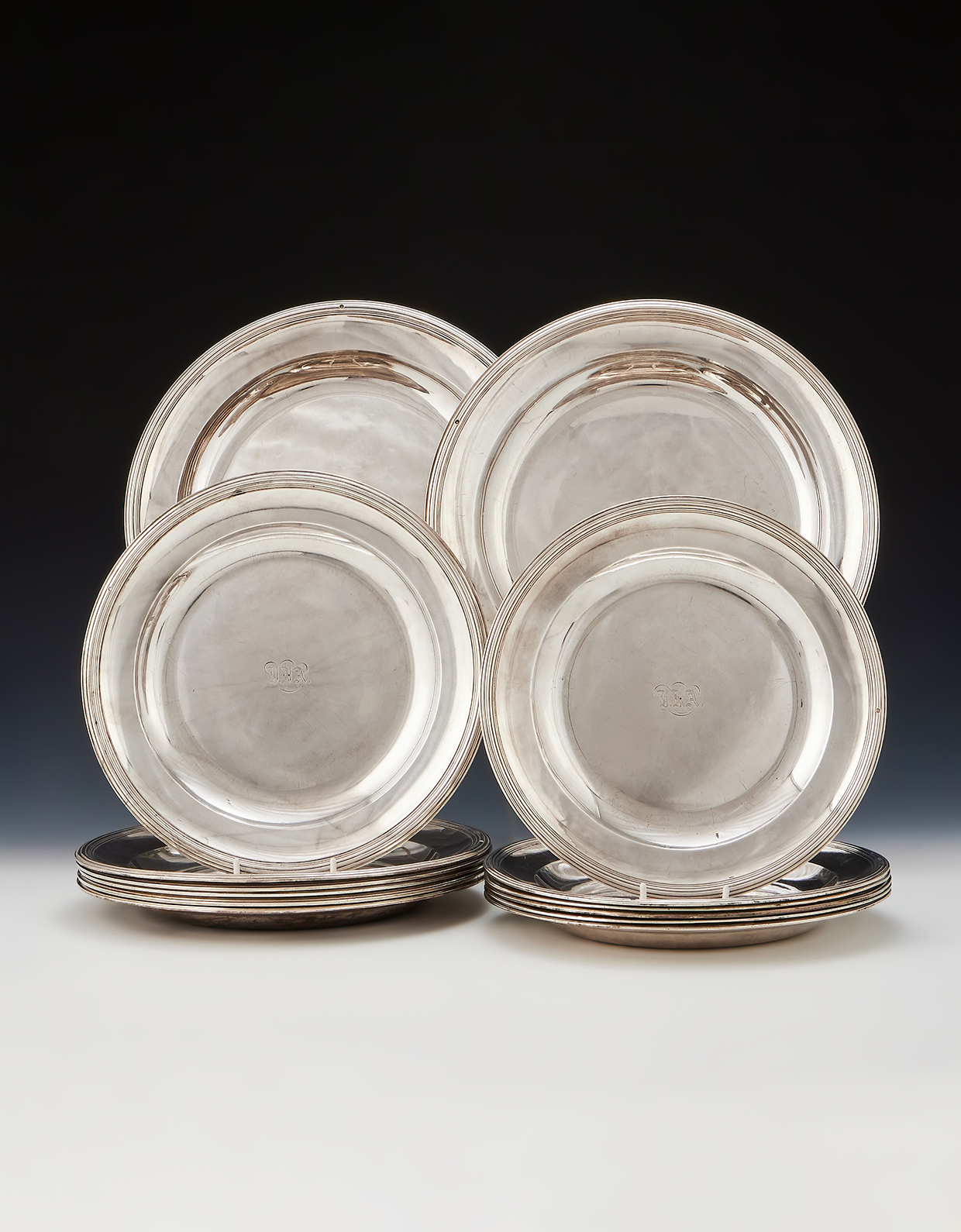 Inline Image - Lot 372: A set of fourteen French Empire silver plates, Jacques-Henri Fauconnier, Paris 1819 - 1838, .950 Standard | Sold for £15,240