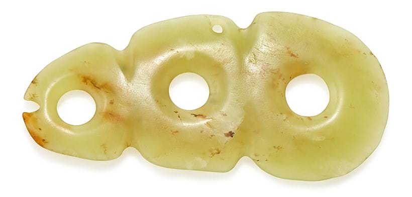 Inline Image - Lot 59: A Chinese yellowish celadon jade three-hole plaque, Hongshan type, circa 3500-2200 BC | Est. £1,000-2,000 (+ fees)