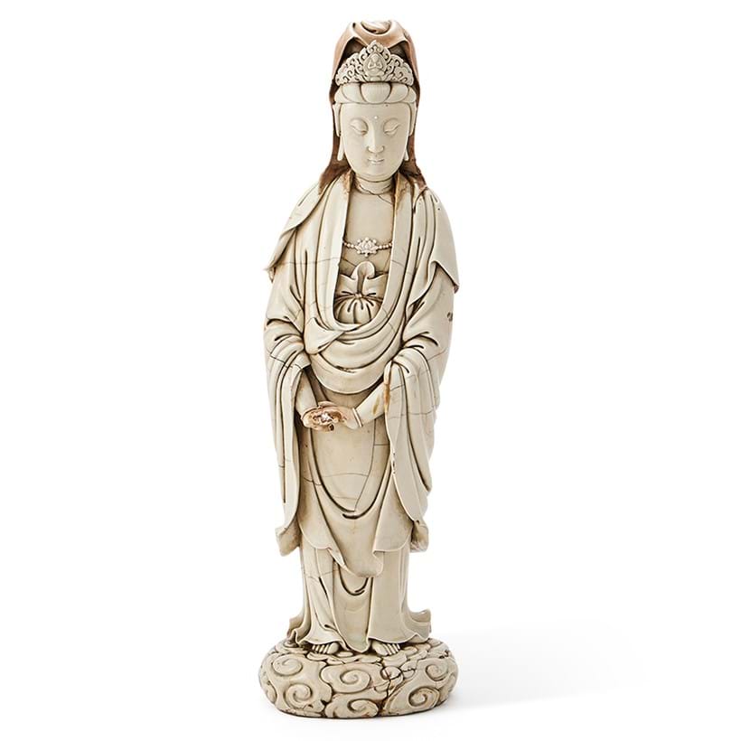 Inline Image - Lot 194: A large and rare Chinese Dehua standing figure of guanyin, Ming Dynasty | Est. £6,000-8,000 (+ fees)