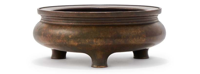 Inline Image - Lot 142: A Chinese bronze tripod censer, 17th Century | Sold for £27,920