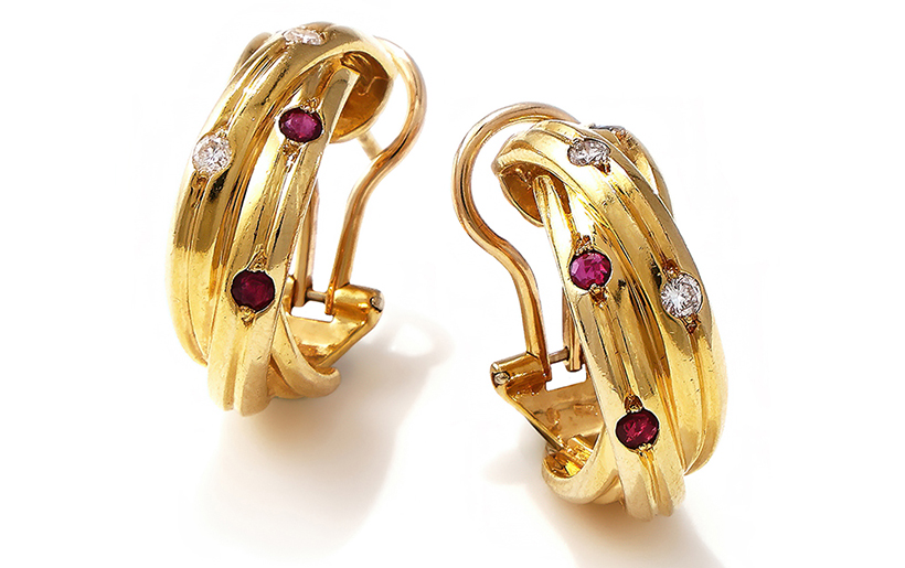 14666 Lot 26 - Cartier, a pair of gem set 'trinity' earrings designed as three interlocking reeded 18ct gold bands 820px.jpg
