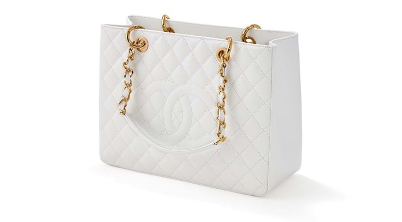 Inline Image - Chanel, grand shopping tote a white caviar lambskin tote | Sold for £4,445