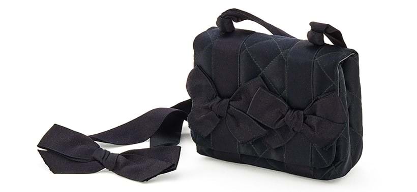 Inline Image - Chanel a black satin bow mini bag, circa 1991-1994 | Sold for £635
