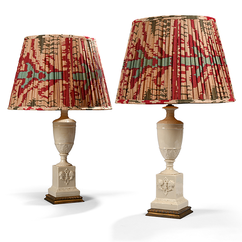 A pair of gilt metal and cream coloured pottery mounted urns adapted as lamps, 20th century