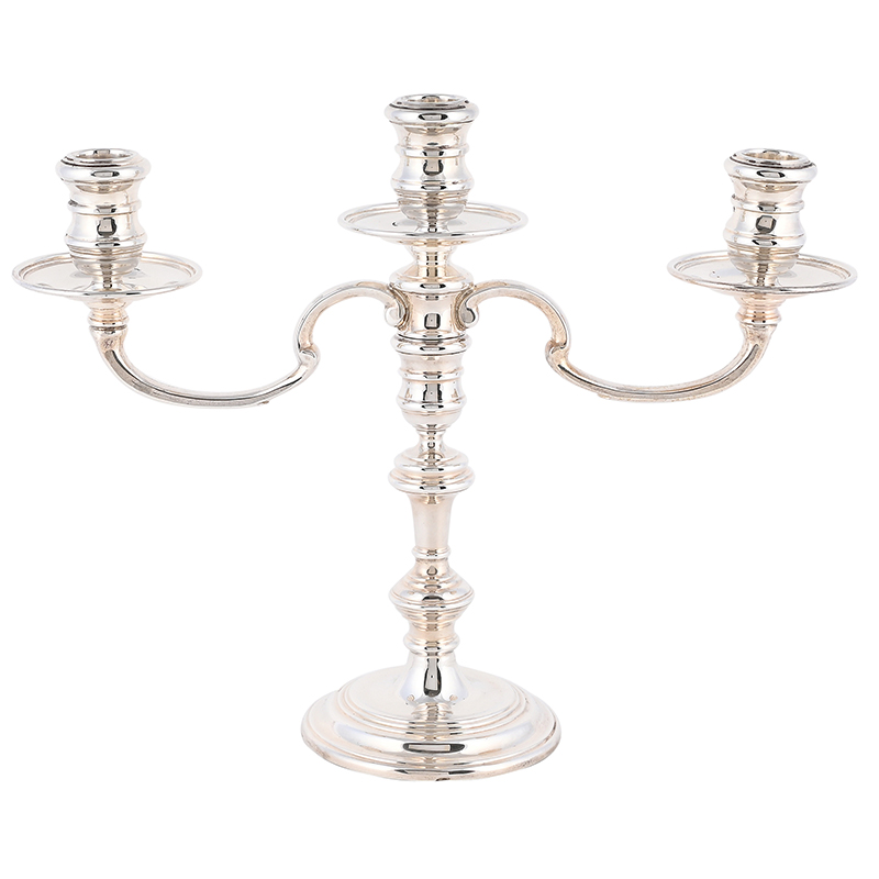 A silver three light candelabra, maker's mark W LD, the base London 1969 and the branches 1971