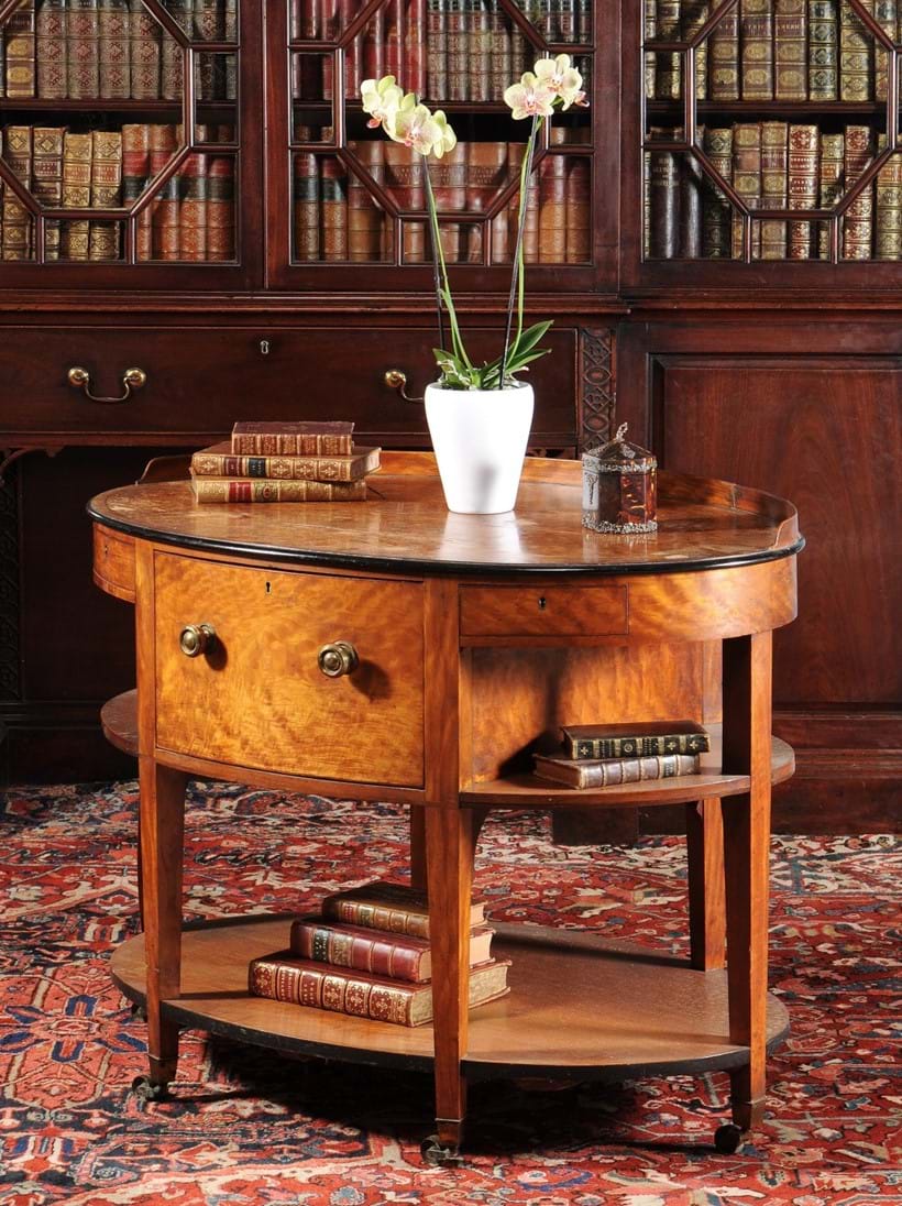 Inline Image - Lot 60, George III satinwood, ebonised and gilt metal mounted rent table, circa 1790; est. £1,500-2,000 (+ fees)