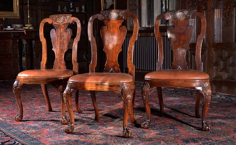 Inline Image - Lot 107: A set of three Chinese Export padouk chairs, circa 1735, after a design by Giles Grendey, circa 1735; est. £15,000-20,000 (+fees)