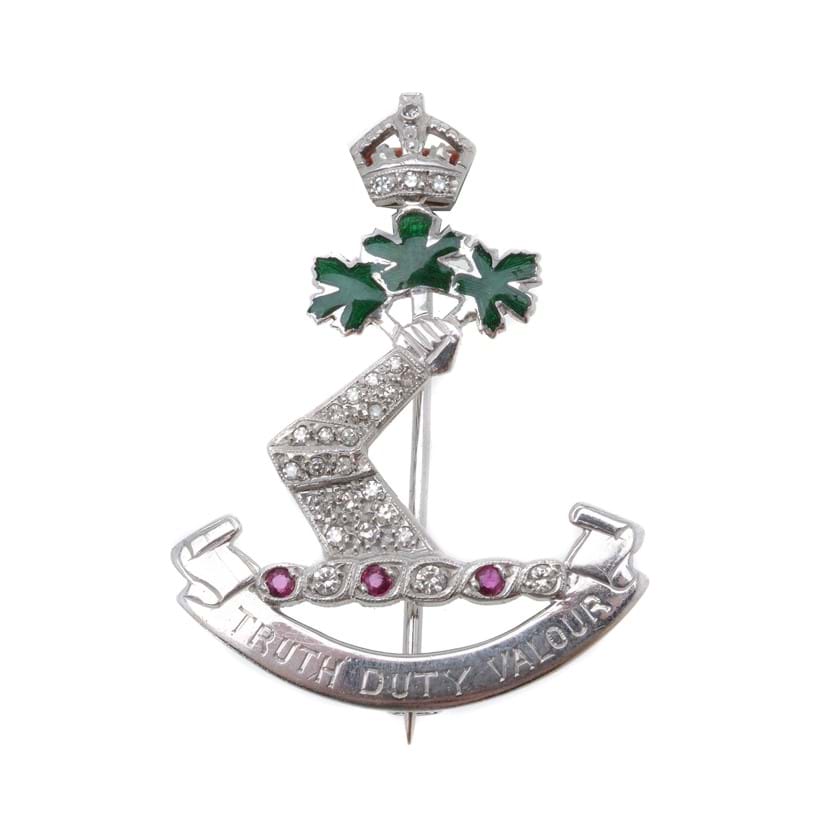 Inline Image - Lot 41, a diamond and ruby Royal Military College of Canada sweetheart brooch, stamped with Garrard & Co. Ltd maker's mark; est. £300-500 (+fees)