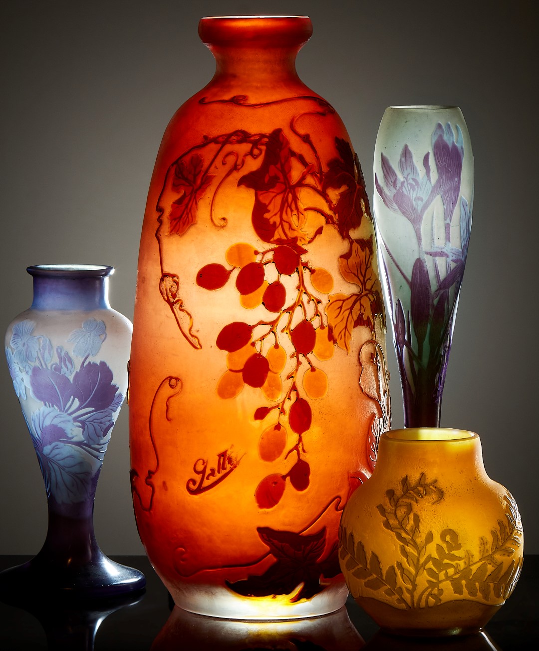 Inline Image - Left to right, lot 84: cameo glass small vase, est. £400-600 (+fees) | lot 70: cameo glass tall vase, est. £1,200-1,800 (+fees) | 
lot 85: cameo glass slender vase, est. £500-700 (+fees) | lot 79: cameo glass small ovoid vase, est. £300-500 (+fees)
