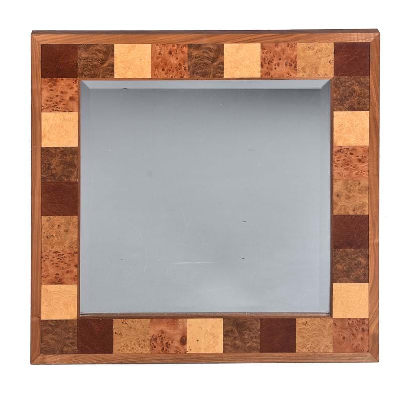 Inline Image - Lot 95: David Linley, a square American walnut and specimen timber inset wall mirror, late 20th century | Est. £400-600 (+fees)