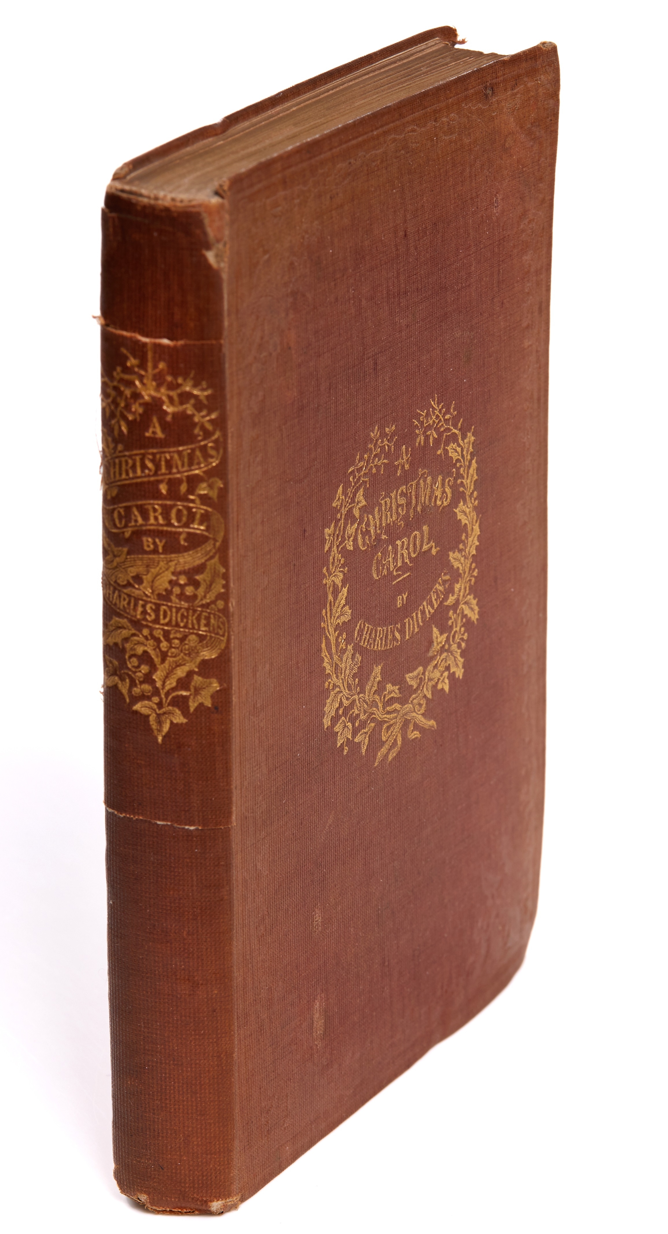 Inline Image - Charles Dickens, A Christmas Carol | first edition, later issue with 'Stave One' | title printed in red and blue, original cloth | Chapman and Hall, London, 1843 | est. £600-800, sold for £1,736