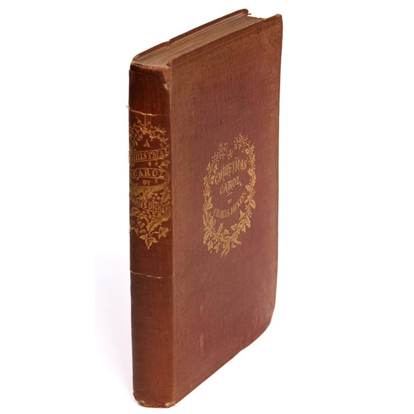 Inline Image - Charles Dickens, A Christmas Carol | first edition, later issue with 'Stave One' | title printed in red and blue, original cloth | Chapman and Hall, London, 1843 | est. £600-800, sold for £1,736