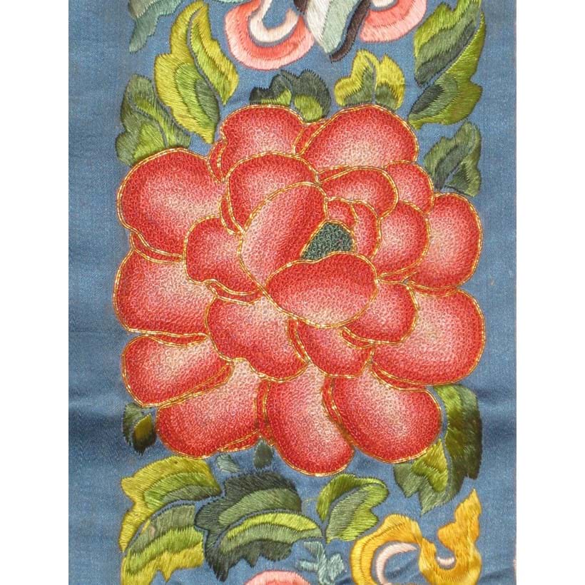 Inline Image - 19th century lady's sleeve decoration, with a large coral coloured peony embroidered in the 'Forbidden' knot | Photograph Courtesy of Linda Wrigglesworth Private Collection, London