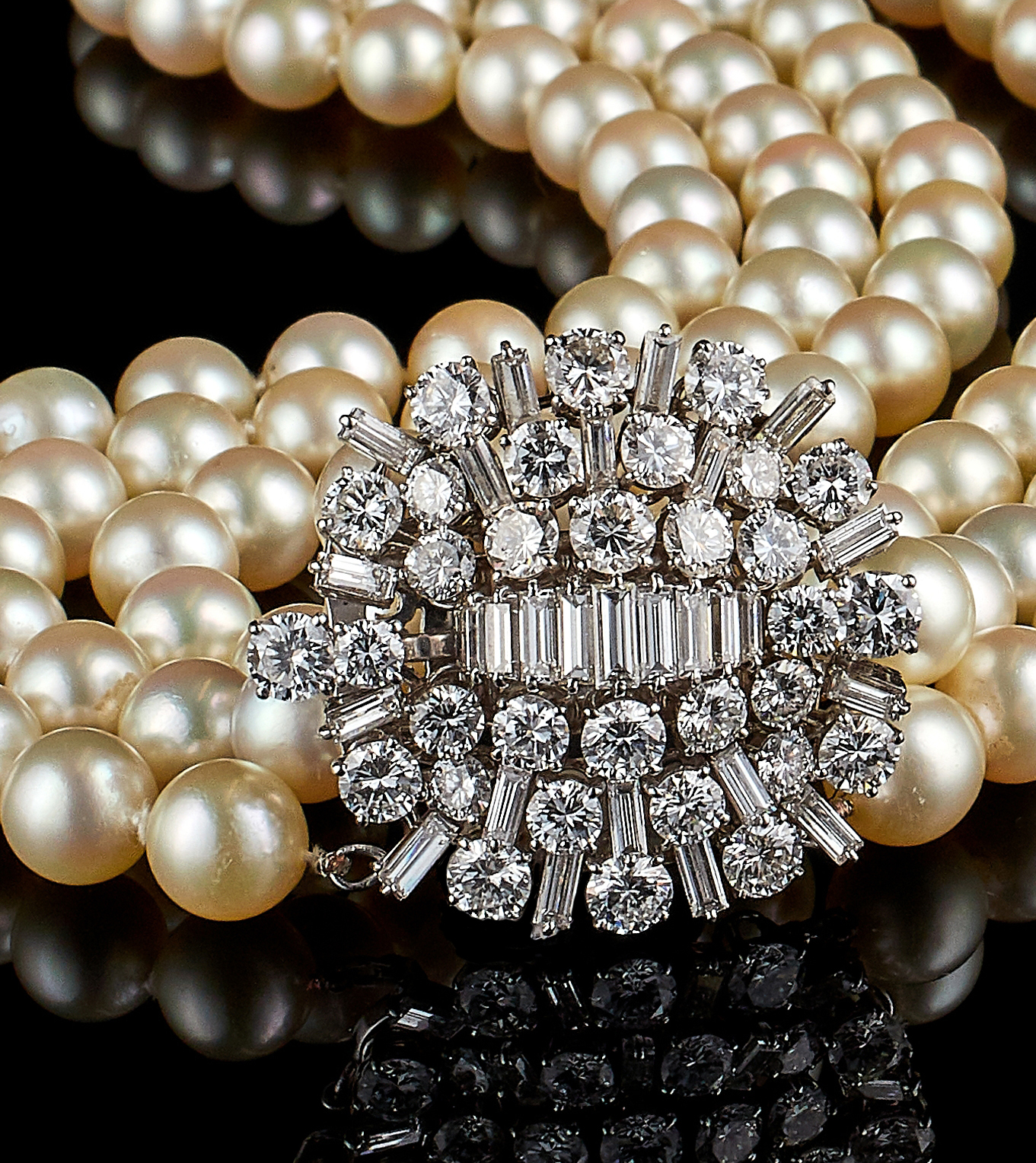 Inline Image - The brilliant- and baguette-cut diamond clasp, with an approximate total diamond weight of 10.37 carats