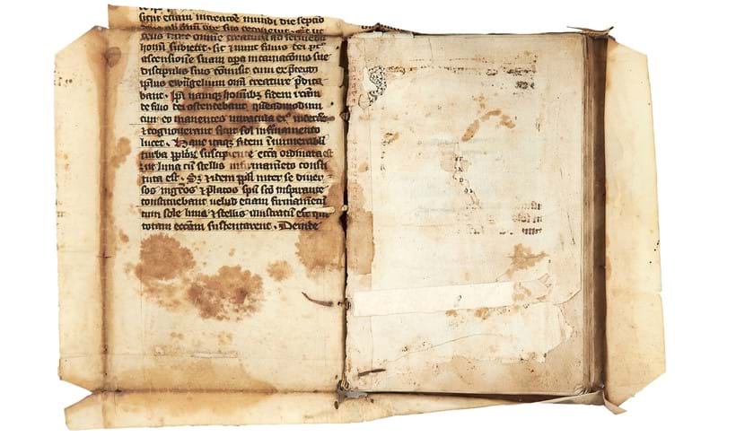 Inline Image - Lot 62: Large fragment of a leaf from Hildegard of Bingen, Explanatio Symboli Sancti Athanasii, an explanation of the Athanasian Creed, in Latin, decorated manuscript on parchment, in situ on the binding of a sixteenth-century printed book [Germany (perhaps Rupertsberg or Eibingen), late thirteenth or early fourteenth century] | Est. £3,000-5,000 (+fees)
