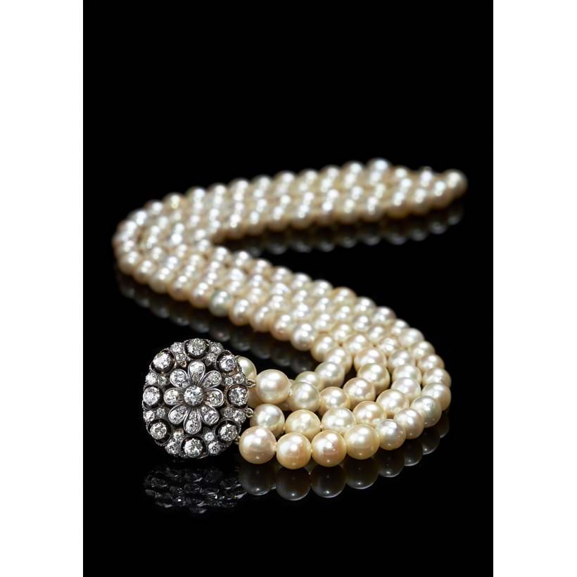 Inline Image - Lot 86: A cultured pearl four row necklace with Victorian diamond clasp | Est. £3,000-5,000 (+fees)