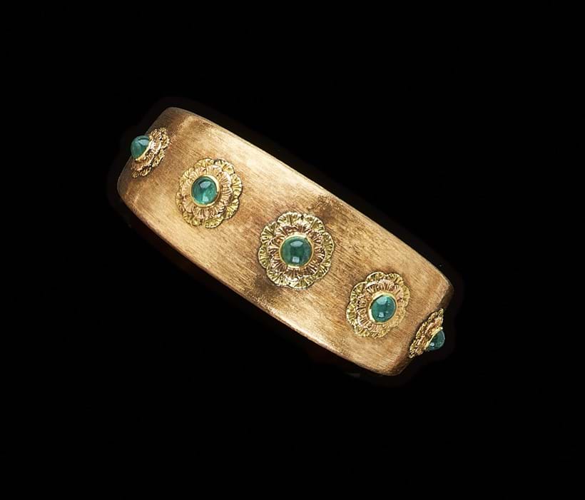 Inline Image - Lot 135: An emerald flower head bangle by Cazzaniga | Est. £1,200-1,800 (+fees)
