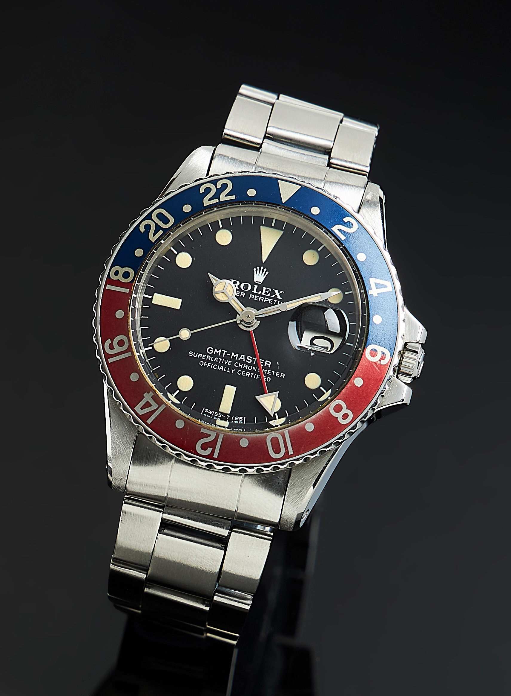 Inline Image - Lot 239: Rolex, Oyster Perpetual GMT-Master, ref. 1675, a stainless steel bracelet watch, no. 3423339, circa 1973 | Est. £8,000-12,000 (+fees)