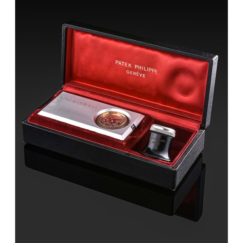 Inline Image - Patek Philippe, a retailer sample watch movement, manual wind,  mounted in a rectangular aluminium case, case, movement and crown signed, accompanied by a Patek Philippe box, and loupe, Est. £8,000-12,000 (+ fees)