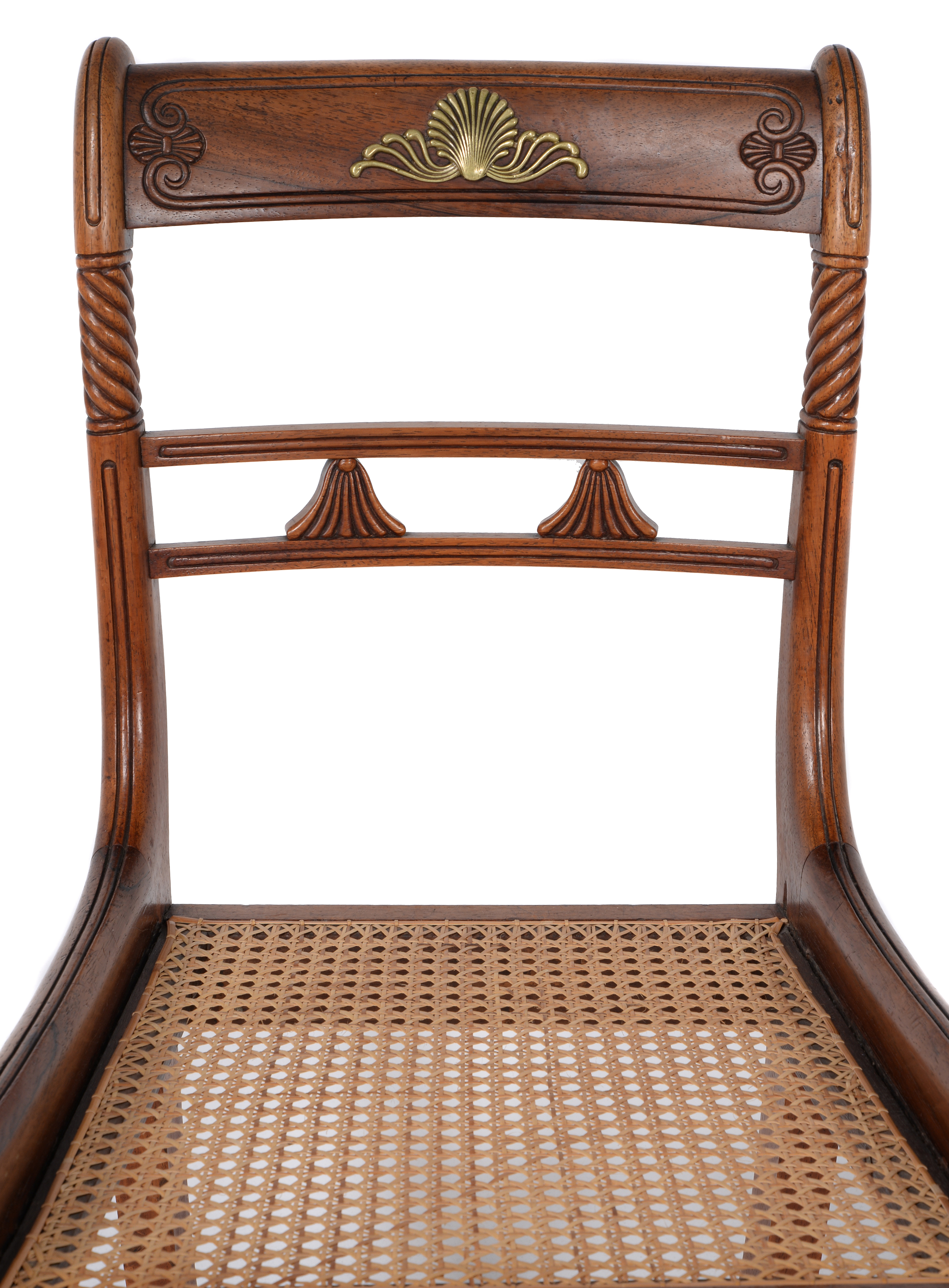 Inline Image - Lot 197: (Detail) Y  A set of six Regency rosewood and gilt metal mounted dining chairs, circa 1815, attributed to Gillows | Est. £400-600 (+ fees)