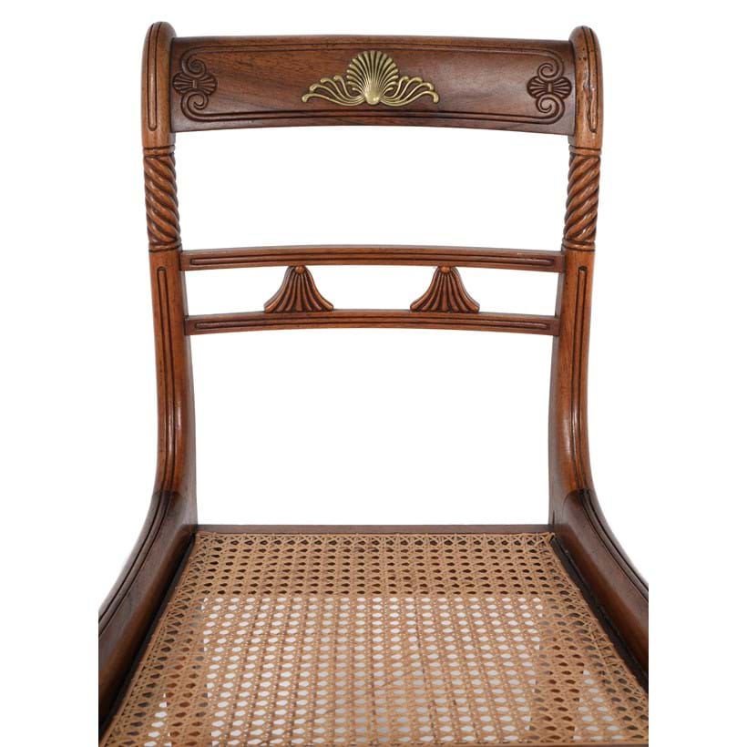 Inline Image - Lot 197: (Detail) Y
 A set of six Regency rosewood and gilt metal mounted dining chairs, circa 1815, attributed to Gillows | Est. £400-600 (+ fees)