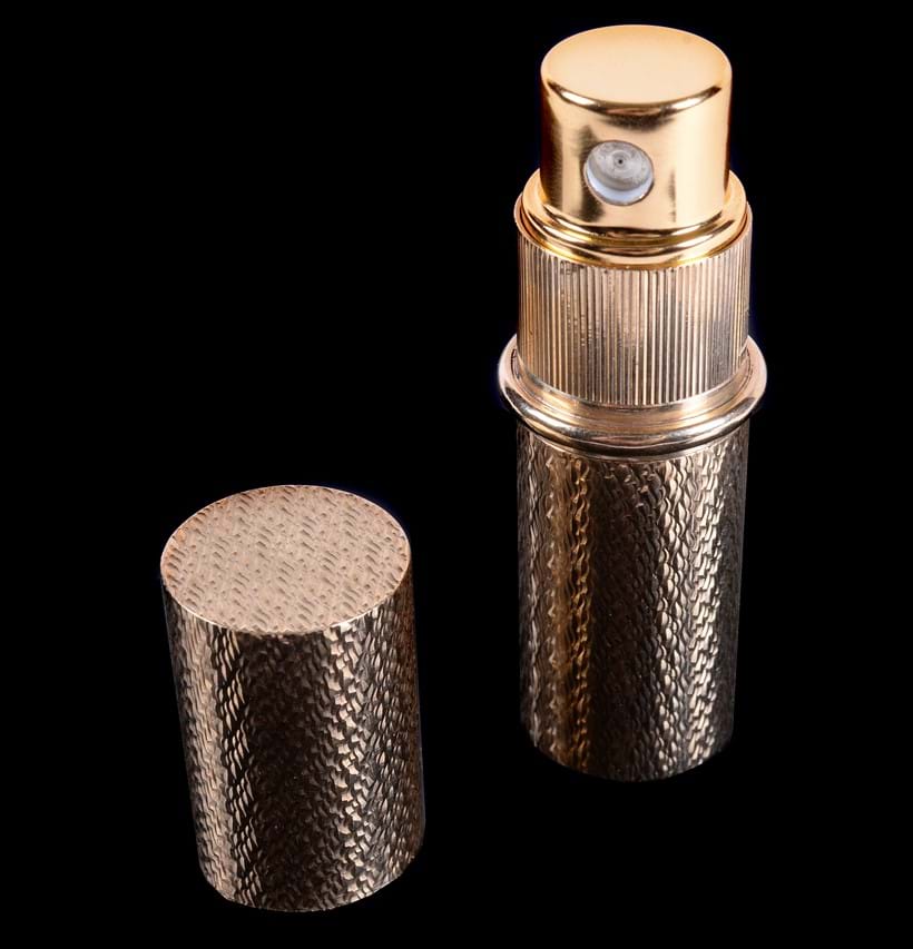 Inline Image - Lot 134: A 1960s 9 carat gold perfume atomiser by Kurt Weiss. Property from the estate of the late Betty, Lady Grantchester | Est. £250-350 (+fees)