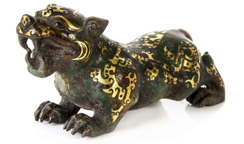 Inline Image - Figure 3: A bronze model of a tiger, Warring States-Western Han style | Sold for £52,000 (hammer price)