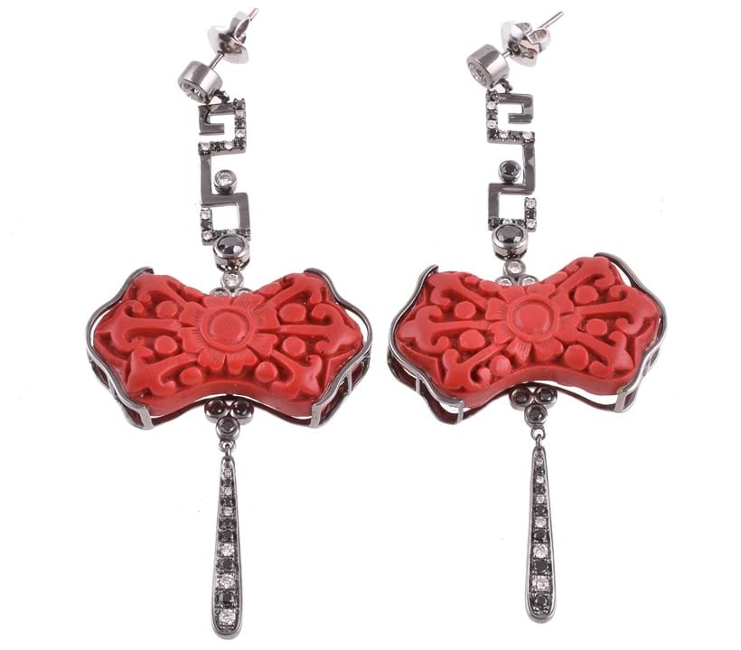 Inline Image - Lot 265: A pair of cinnabar lacquer, diamond and black diamond pendent earrings by Bochic, New York | Est. £400-600 (+fees)