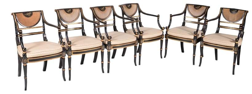 Inline Image - Lot 479: A set of twelve ebonised and parcel gilt armchairs, in Regency style, 20th century | Est. £1,000-1,500 (+fees)