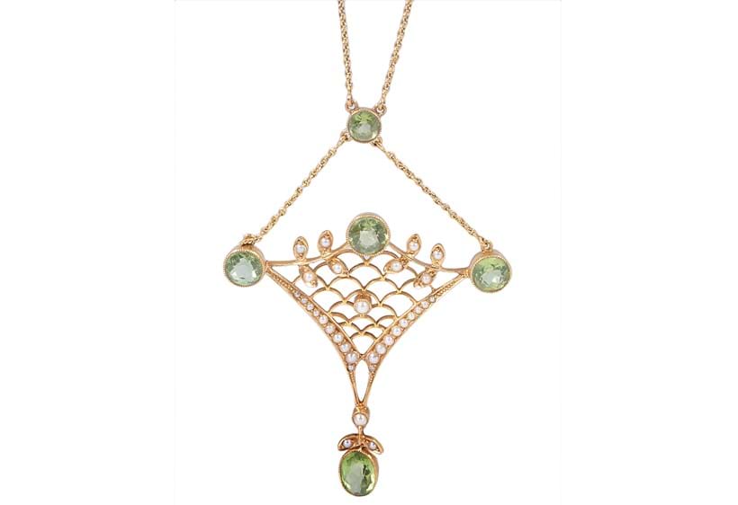 Inline Image - An Edwardian peridot and half pearl pendant, circa 1910 | Sold for £450 (hammer price), March 2013