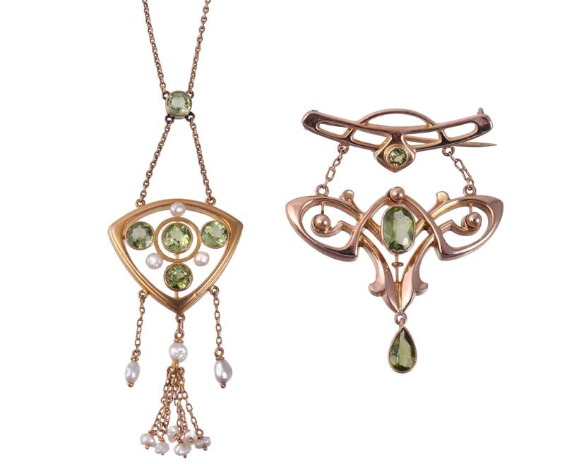 Inline Image - An Arts and Crafts peridot brooch by Liberty & Co., circa 1900, and an Arts and Crafts peridot and freshwater pearl pendant necklace by B. H. Joseph & Co., circa 1900 | Est. £200-300 (+fees), August 2020