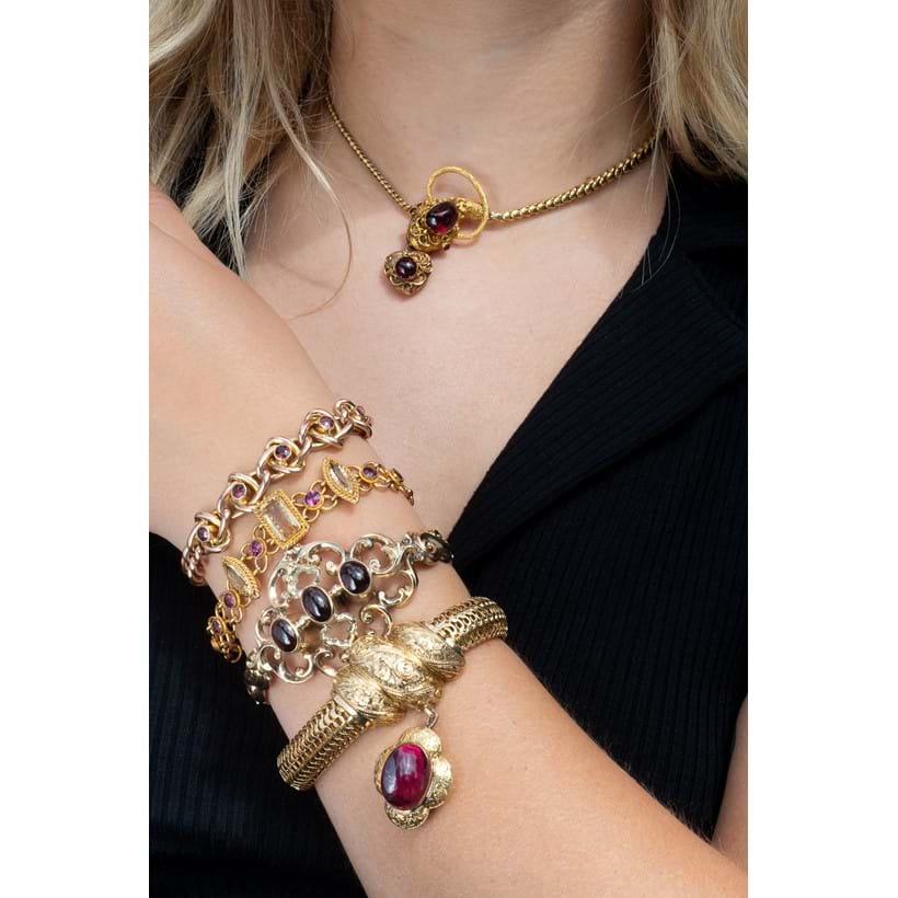 Inline Image - Lot 212: An early Victorian gold and garnet serpent necklace, circa 1840 | Est. £800-1,200 (+fees); Lot 221: A late Victorian garnet bracelet, circa 1900 | Est. £80-120 (+fees); Lot 220: A late Victorian rhodolite garnet and topaz bracelet, circa 1900 | Est. £150-250 (+fees); Lot 222: A mid Victorian gold and garnet bracelet, circa 1860 |  Est. £150-250 (+fees); Lot 211: A late Victorian gold and garnet bracelet, circa 1880 | Est. £500-700 (+fees)