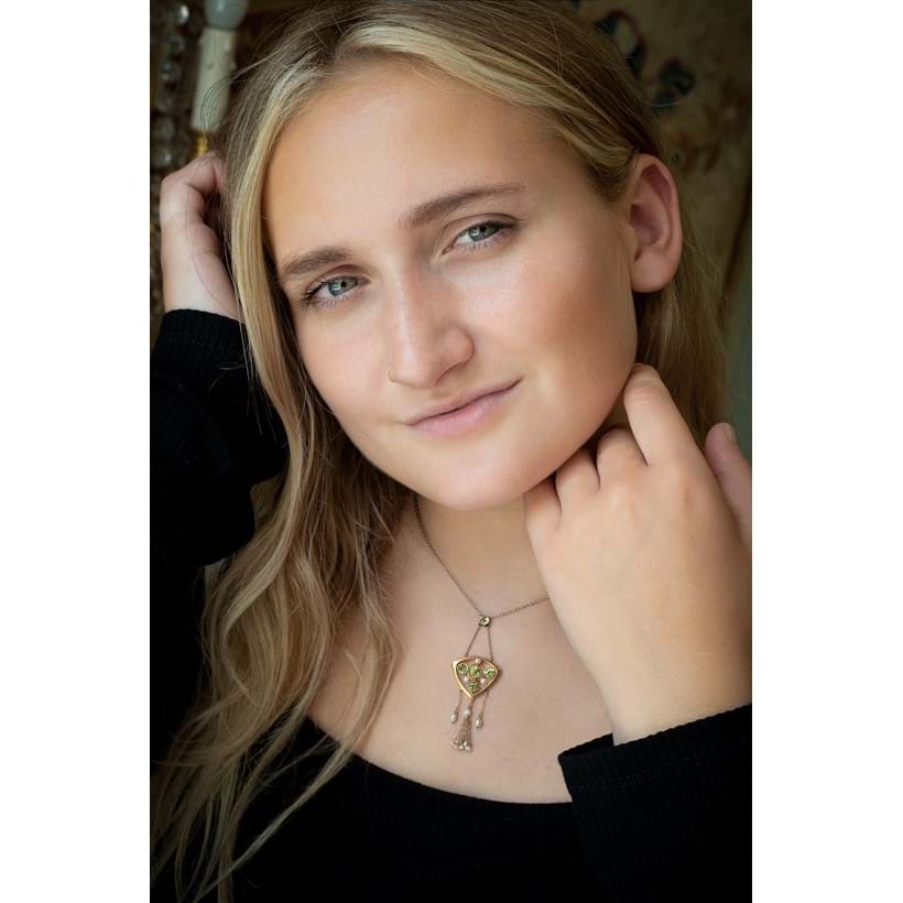 Inline Image - Lot 277: (Part lot) An Arts and Crafts peridot and freshwater pearl pendant necklace by B. H. Joseph & Co., circa 1900 | Est. £200-300 (+fees) | The perfect example of a necklace that should be wiped with a soft lint free cloth