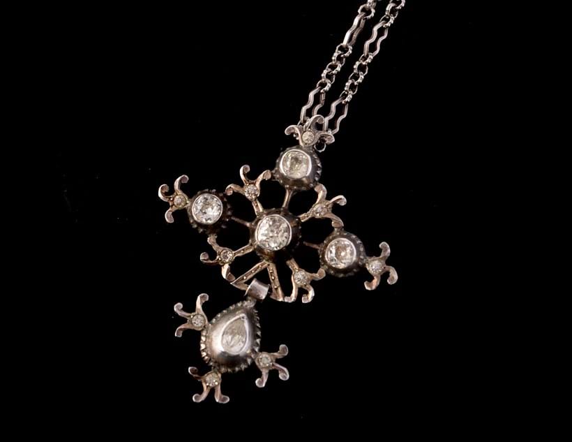 Inline Image - Lot 154: (Part lot) A 19th century white paste pendant on a fancy link chain | Est. £250-350 (+fees)
