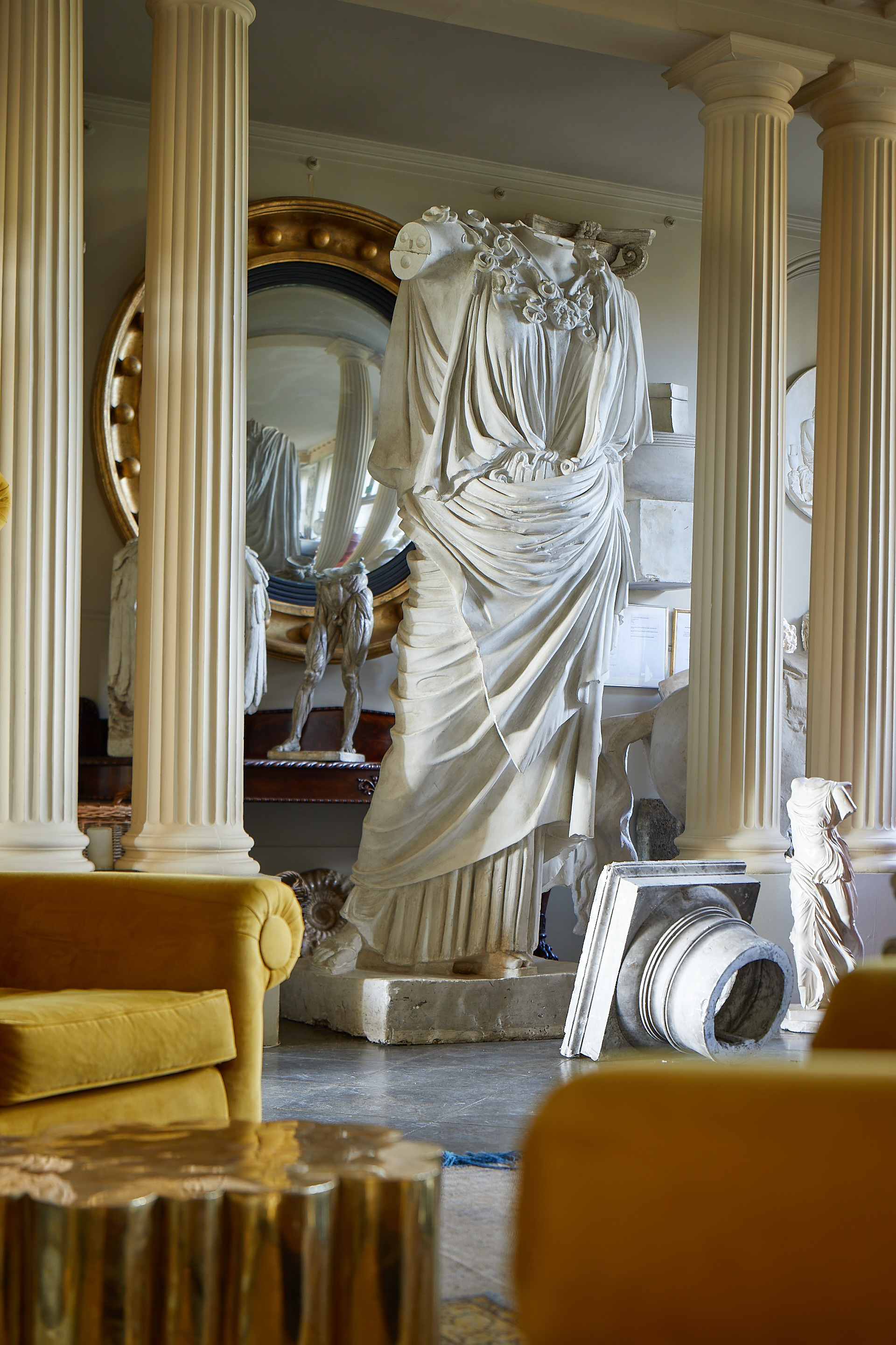 Inline Image - Lot 38: A LARGE AND IMPRESSIVE PLASTER MODEL OF PALLAS VELLETRI 
MODERN, AFTER THE ANTIQUE, The goddess portrayed fully draped and with coiled necklace, partial cast lacking arms and head, 275cm high | Est. £7,000-10,000 (+fees)