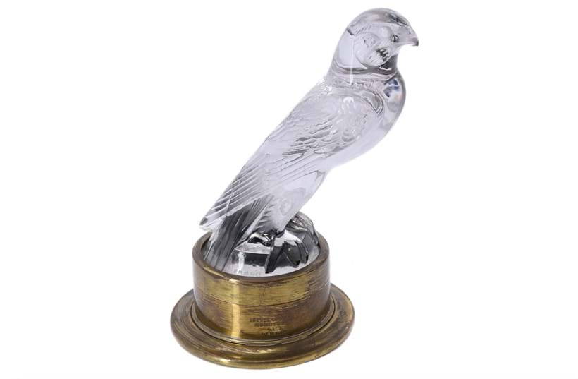 Inline Image - Lot 114: Lalique, René Lalique, Faucon, a clear glass car mascot, designed circa 1925 | Est. £300-500 (+fees)